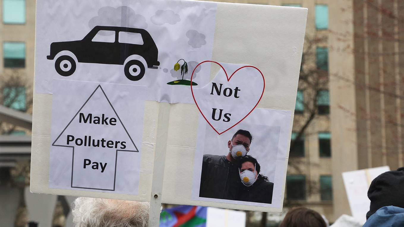 frankel107_ Creative Touch Imaging Ltd.NurPhoto via Getty Images_carbontaxprotestposter