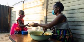 kufuor2_JEKESAI NJIKIZANAAFP via Getty Images_zimbabwe food scheme