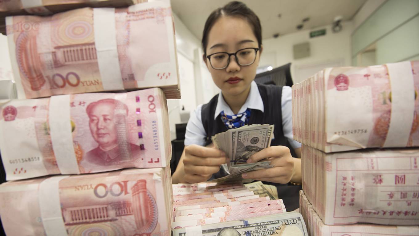 bjcohen12_XuJinbaiVCGviaGettyImages_chinarenminbiuscurrency