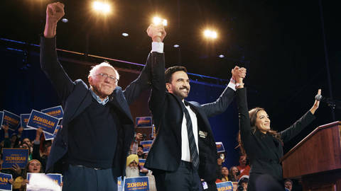 New York Mayoral Candidate Zohran Mamdani, center, celebrates with Sen. Bernie Sanders, left, and U.S. Rep. Alexandria Ocasio-Cortez, right, during an election rally at Forest Hills Stadium in the Queens borough of New York City.