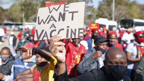 stiglitz322_PHILL MAGAKOEAFP via Getty Images_vaccineprotest