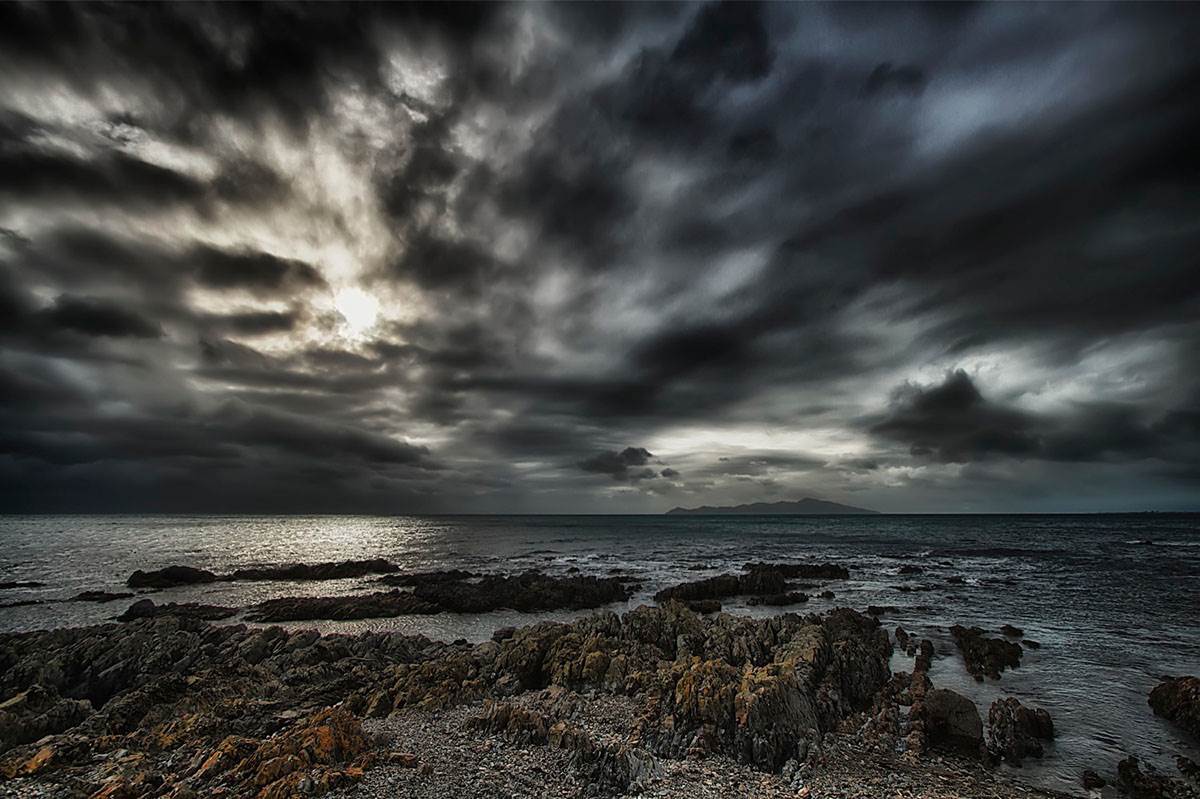Dark clouds over sea