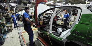  Workers at the Iranian Khodro car manufacturing plant make Iranian car models 