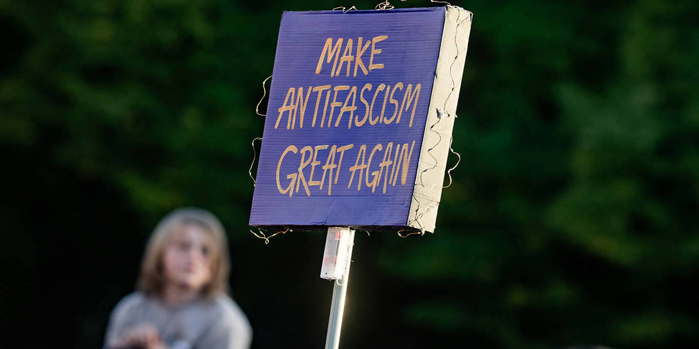 Demonstrators protest the AfD’s strong showing in the Saxony-Anhalt state election in front of the Brandenburg Gate in Berlin, Germany, on September 7, 2026. A banner reads, “Make antifascism great again.”