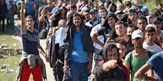 Line of male refugees