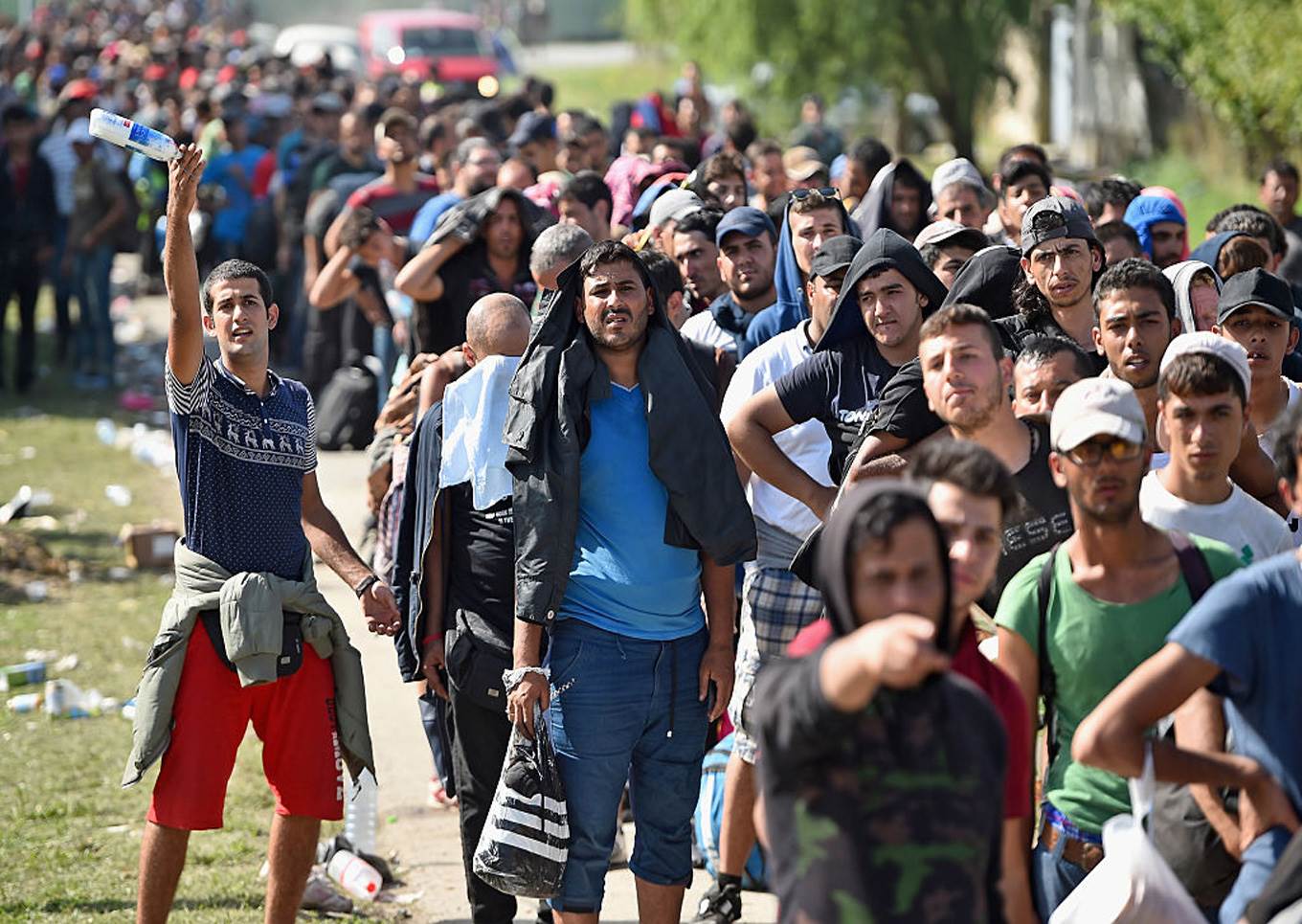 Line of male refugees