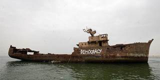Democracy Painted on a Rusted Boat