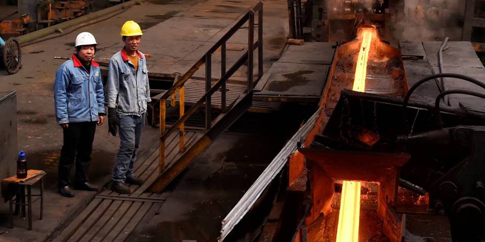 Worker stand in a steel workshop in Zouping