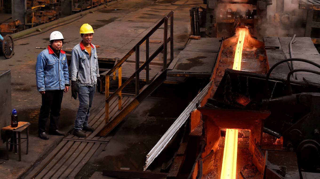 Worker stand in a steel workshop in Zouping