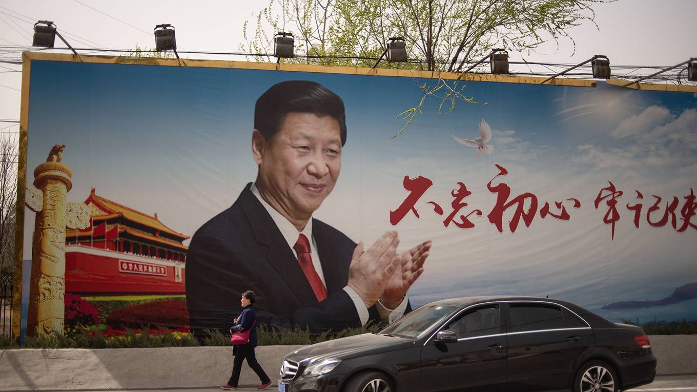 pei48_FRED DUFOURAFPGetty Images_xi jinping billboard