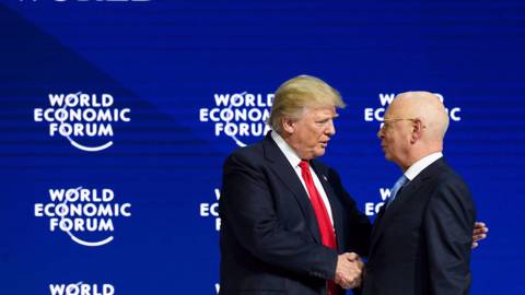 stiglitz268_FABRICE COFFRINIAFP via Getty Images_trump davos