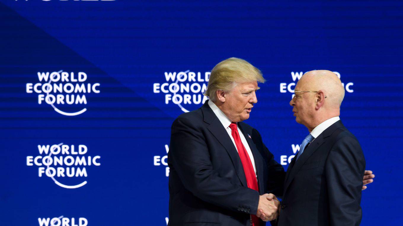 stiglitz268_FABRICE COFFRINIAFP via Getty Images_trump davos