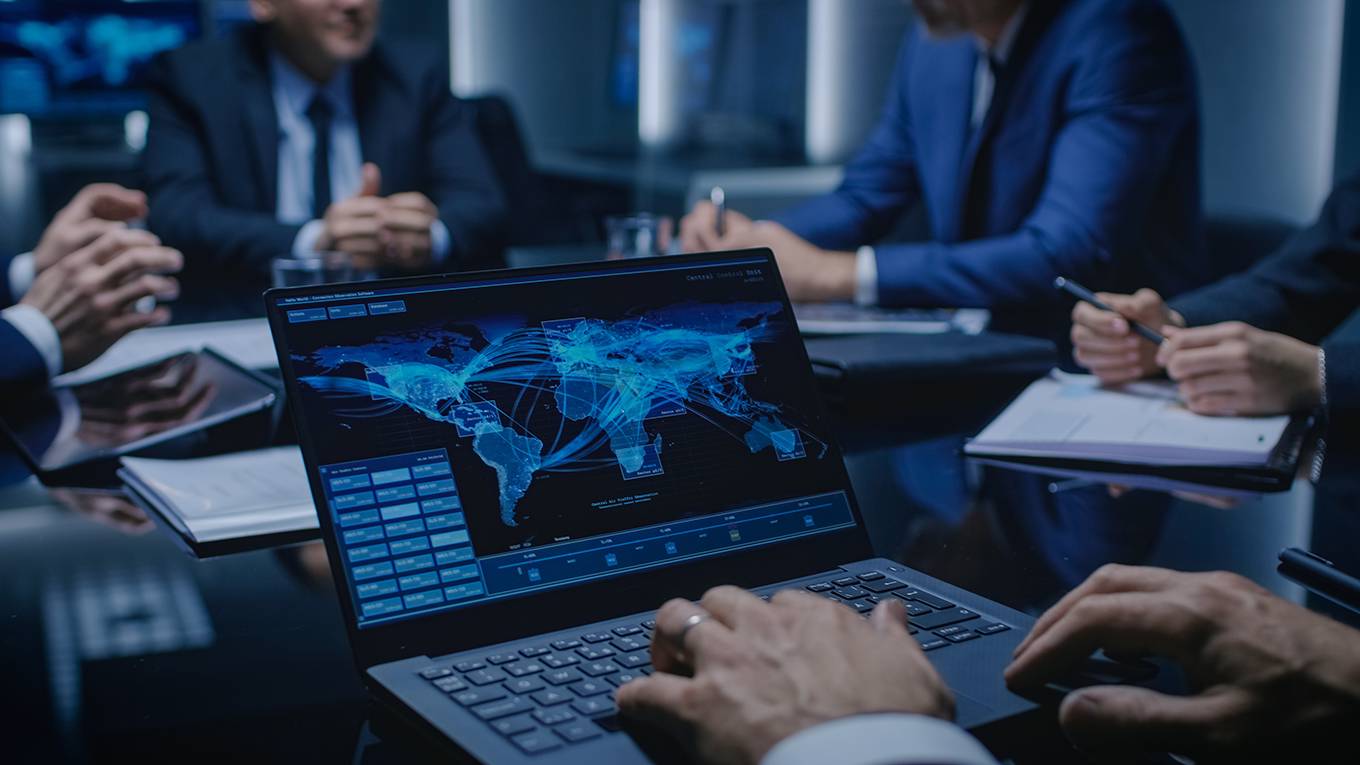 dervis88_GettyImages_businessmeetingcomputermap