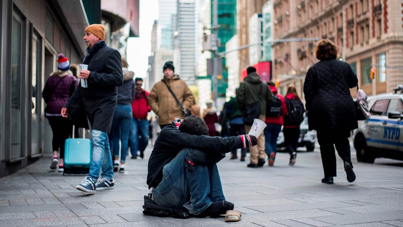 A man begs for money