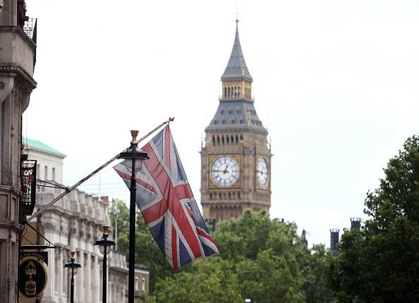 ellemannjensen20_Bloomberg_Getty Images_British clock and flag