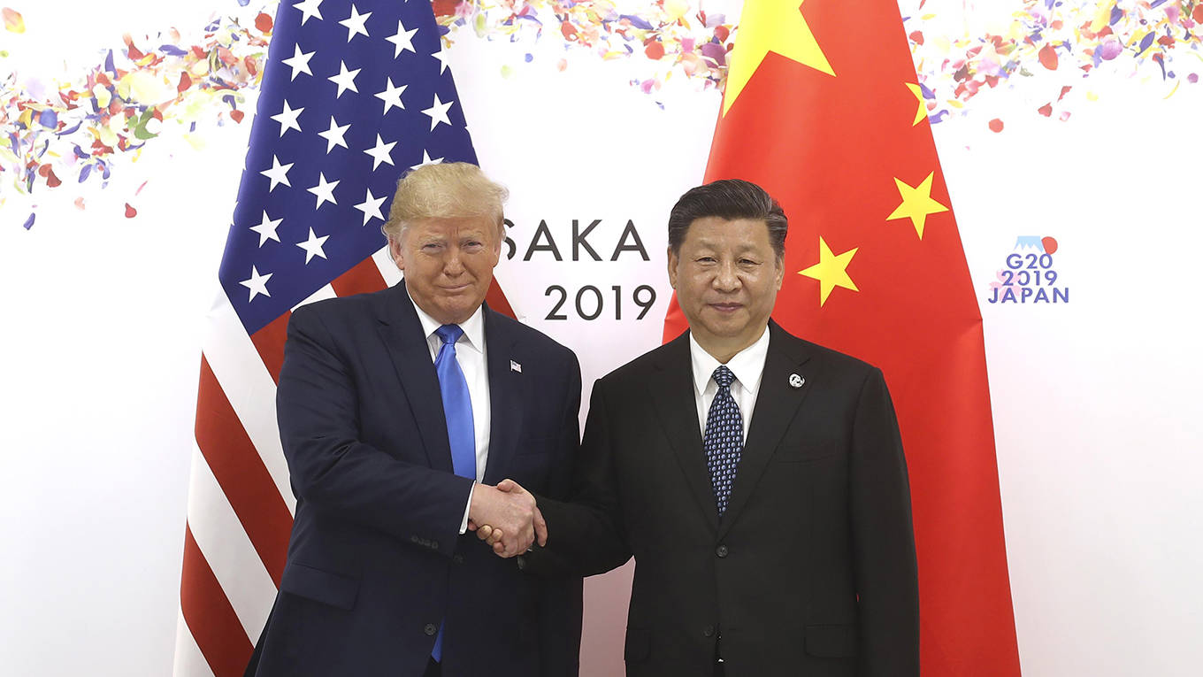 yu49_ShengJiapengChinaNewsServiceVCGviaGettyImages_G20trumpjinpingshakehands