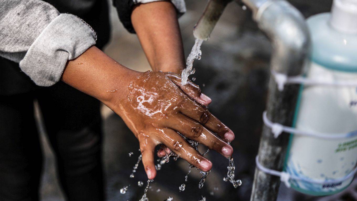 dupas1_Aditya SaputraINA Photo AgencyUniversal Images Group via Getty Images_hand washing covid