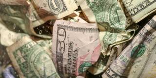 varoufakis95_Getty Images_crumpled money