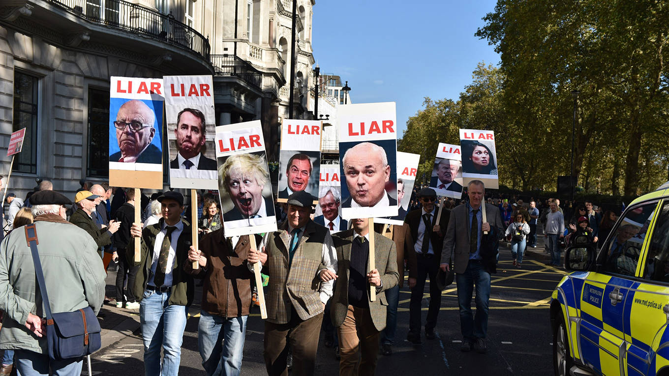 levy35_JohnKeebleGettyImages_liarbrexitprotestsigns