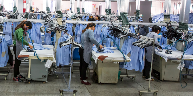 Women work in a shirt factory in China
