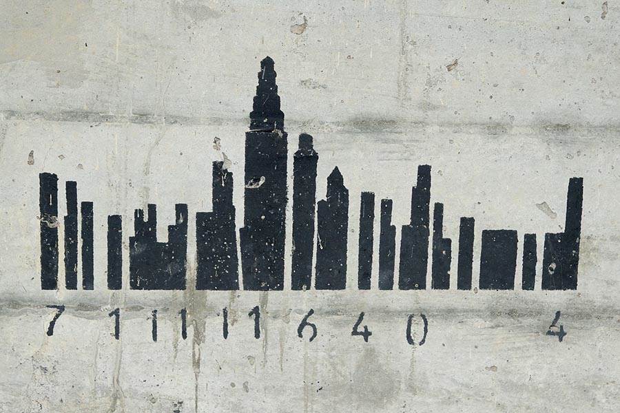 Graffiti depicting city with code underneath