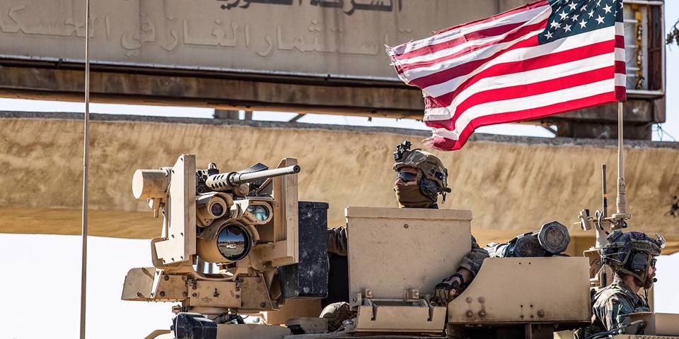 haass108_DELIL SOULEIMANAFP via Getty Images_USflagsoldiersyria