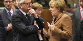 Angela Merkel and Jean-Claude Juncker at emergency refugee summit.