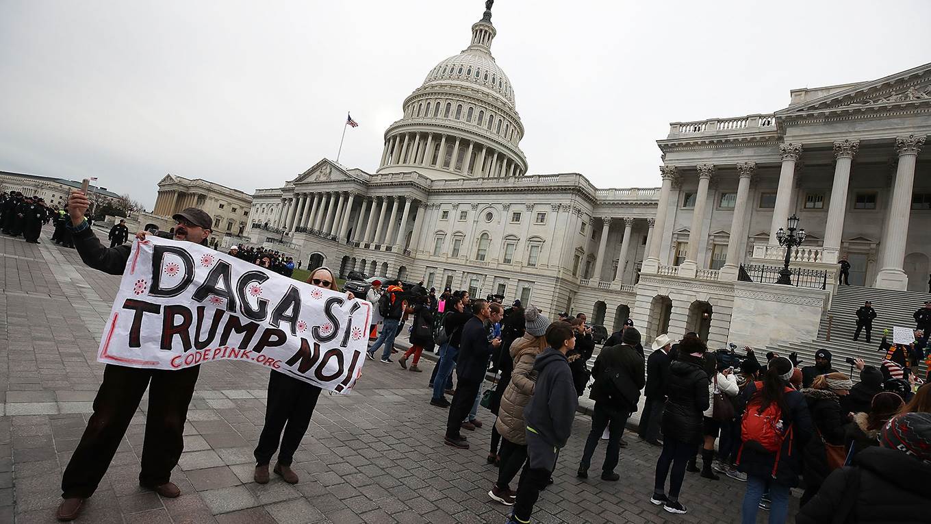 People who call themselves Dreamers protest in front of the Senate side of the US Capitol