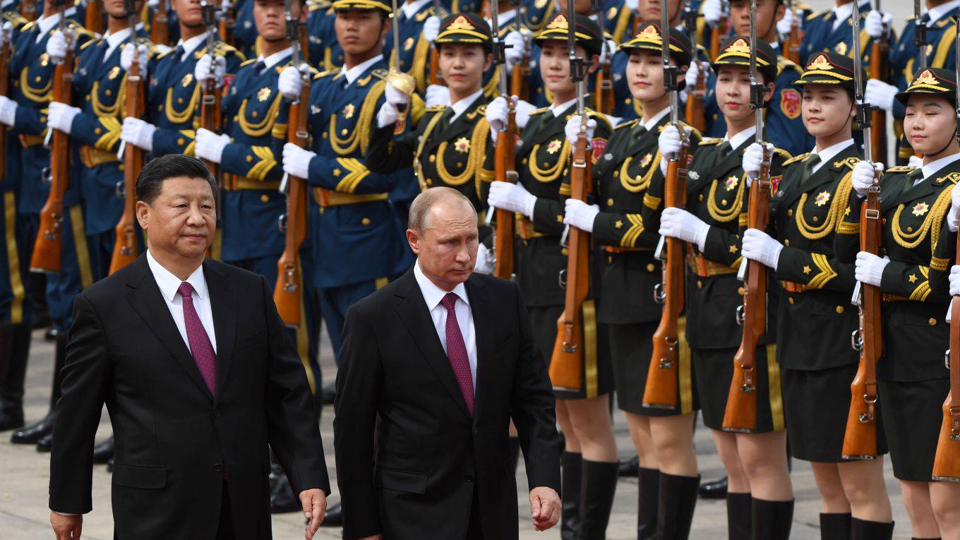 patten117_GREG BAKERPOOLAFP via Getty Images_xi putin