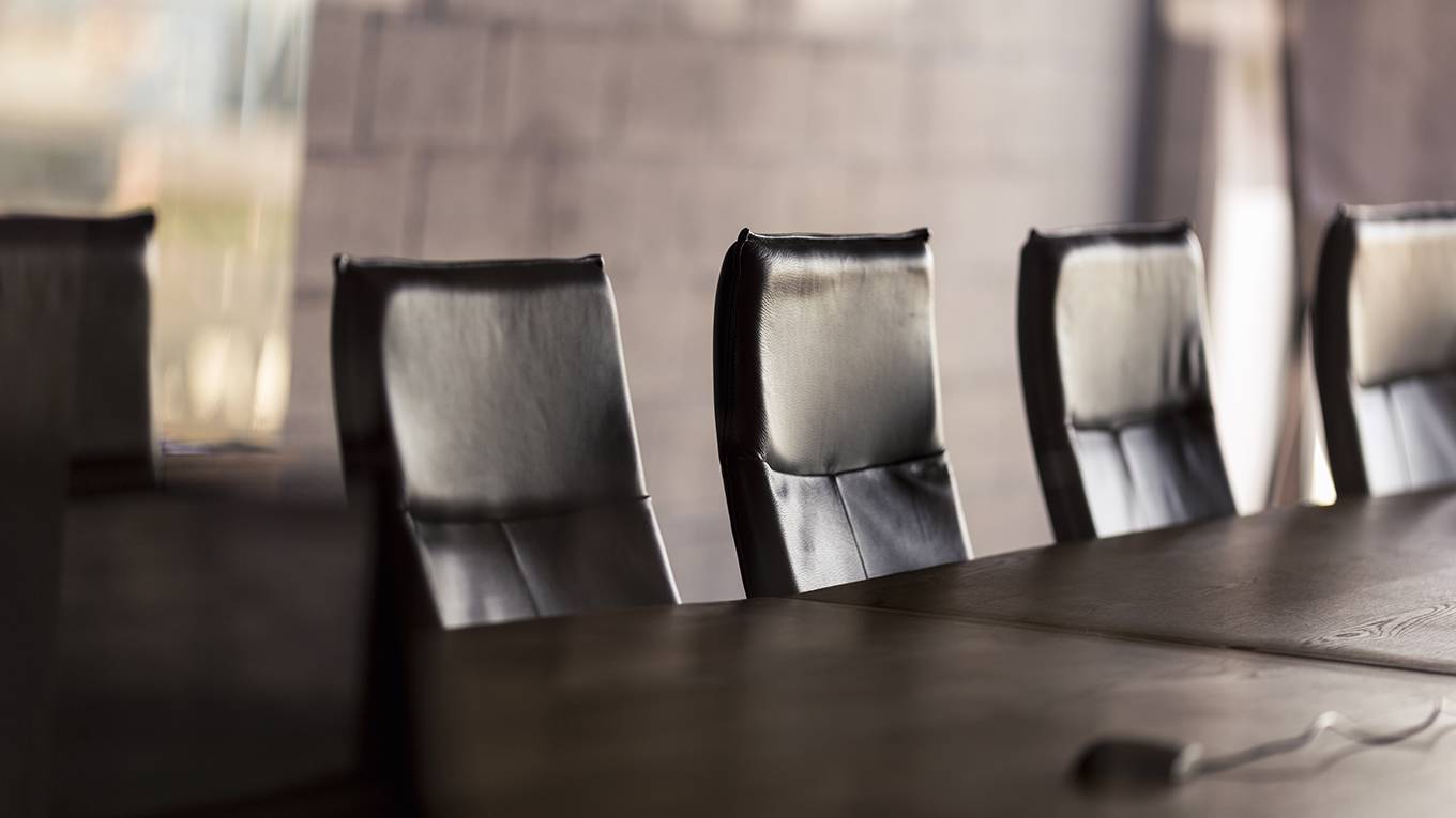 ashong1_PortraGettyImages_emptybusinessmeetingchairs
