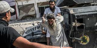 Captured Islamic State militants in Mosul
