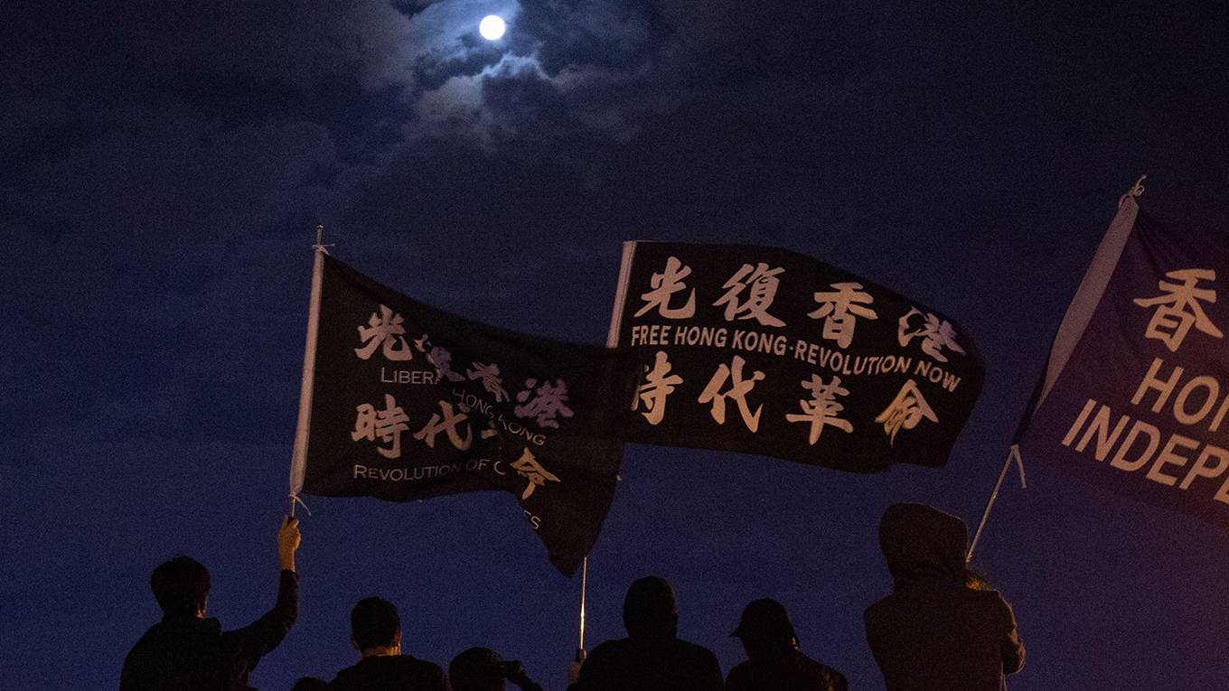 wong4_ALASTAIR PIKEAFP via Getty Images_hongkongprotestflagmoon