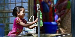fayolle3_MUNIR UZ ZAMANAFP via Getty Images_drinking water
