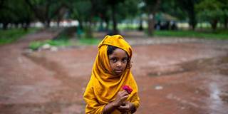 Homeless child rain Dhaka