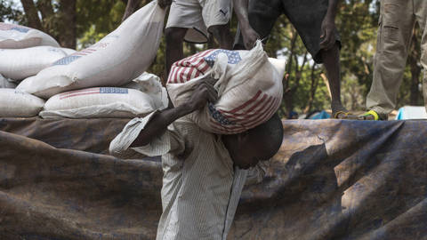 fofack31_Fred DufourGettyImages_usaid_bag_car