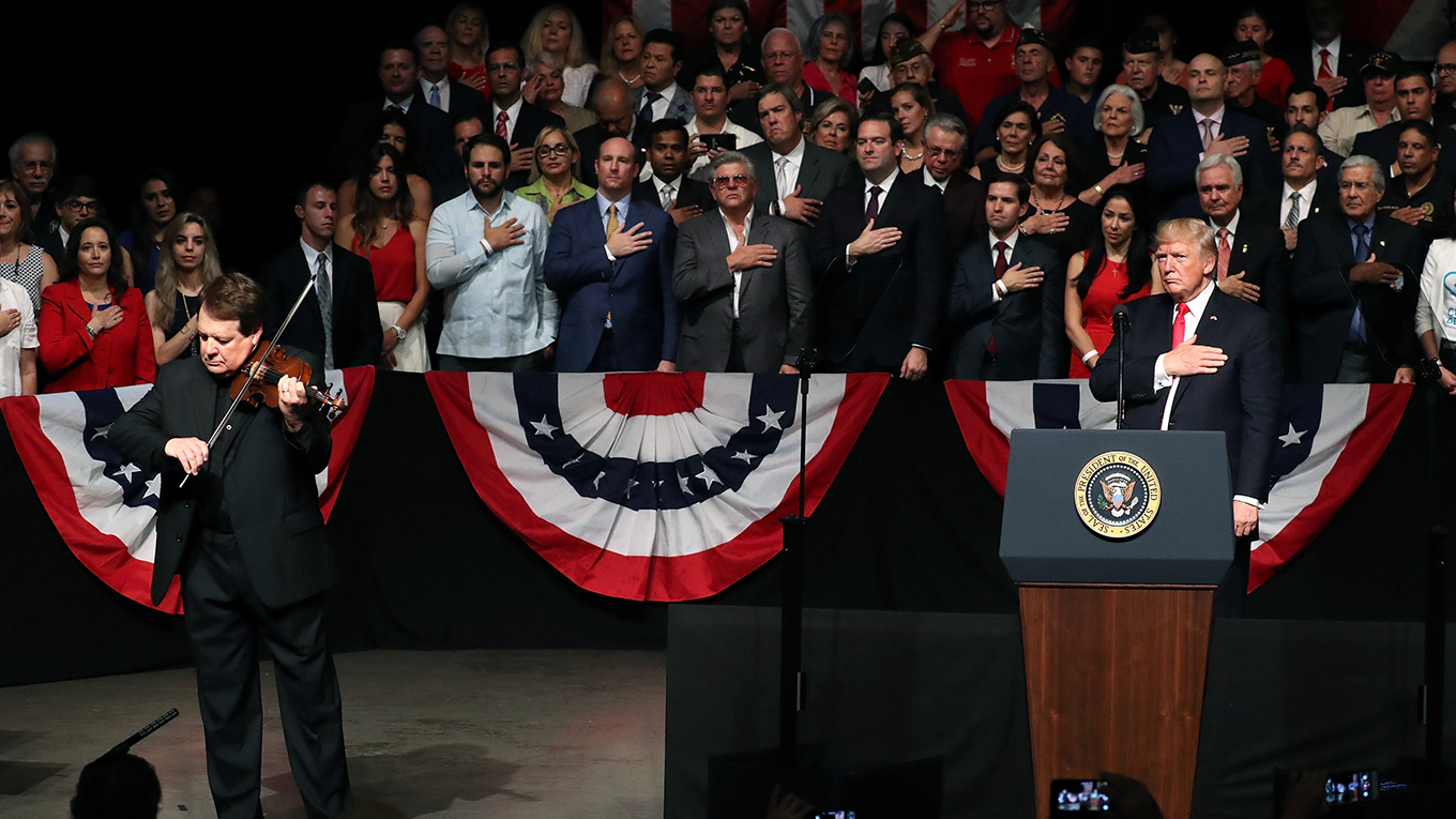 President Donald Trump watches as Cuban violinist