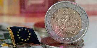 Greek euro coin and European Union pin