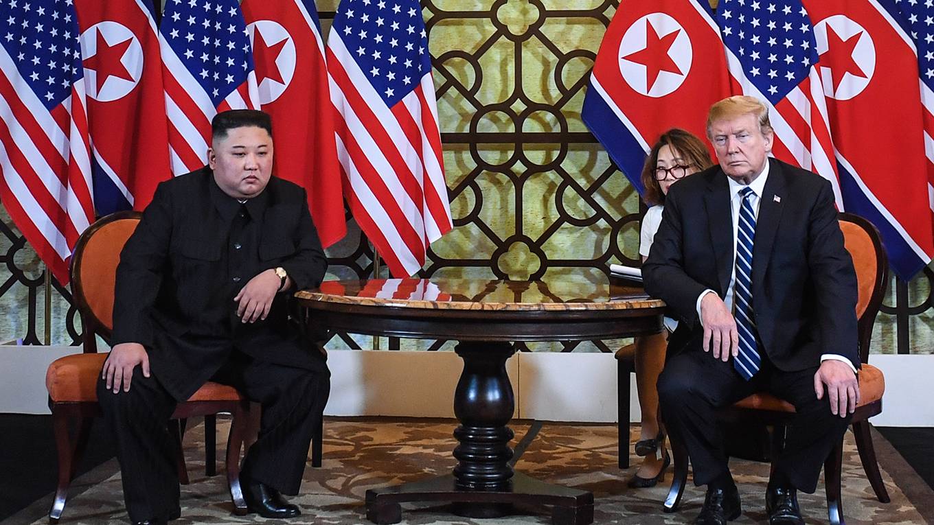 lee38_SAULLOEBAFPGettyImages_trumpjongunsittingunhappily