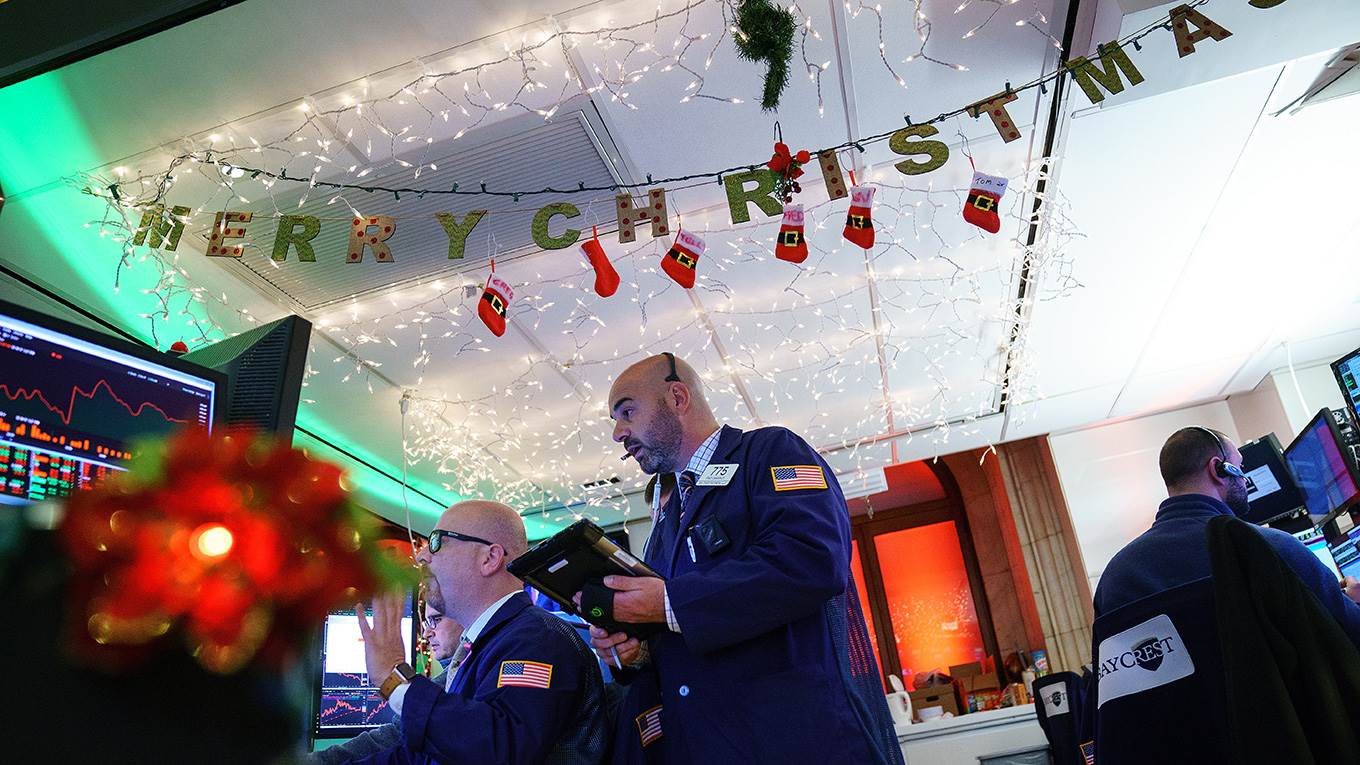 Traders work on the floor on NYSE