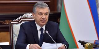 hug1_Presidency of Uzbekistan  HandoutAnadolu Agency via Getty Images_mirziyoyev