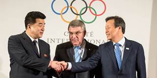 IOC President Thomas Bach stands with Mr. Kim Il Guk, DPR Korea, and Mr. Jong Whan Do, South Korea