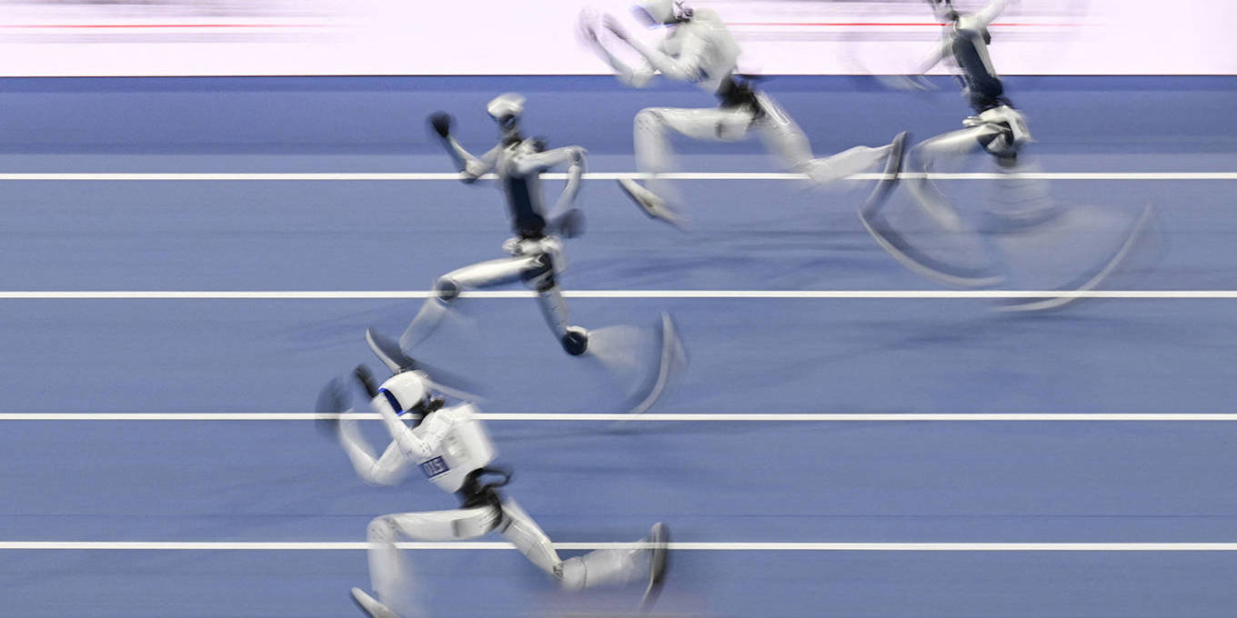 Humanoid robots compete in a 100-meter race at the World Humanoid Robot Games in Beijing, China.