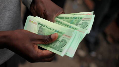 tmasiyiwa1_WILFRED KAJESEAFP via Getty Images_remittances