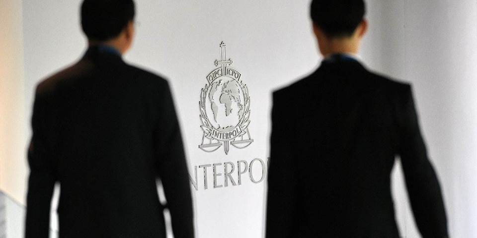 A logo at the Interpol Global Complex for Innovation building 