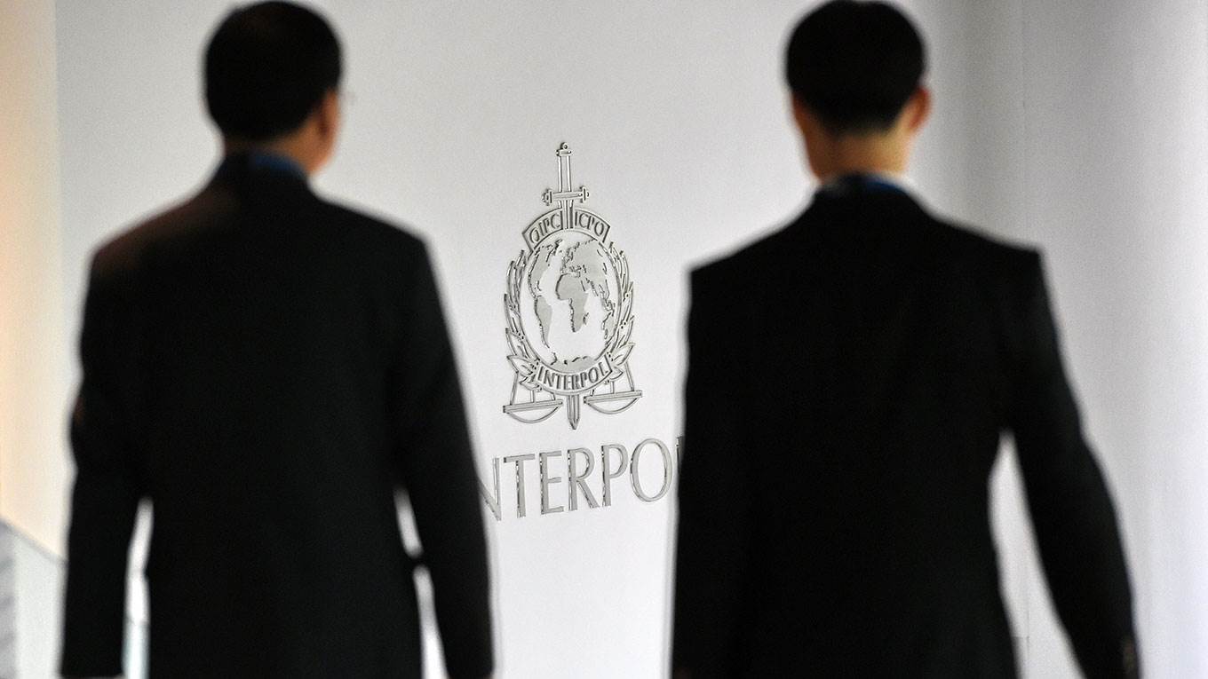 A logo at the Interpol Global Complex for Innovation building