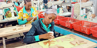 Employees of shoe manufacturing park at work in Addis Ababa