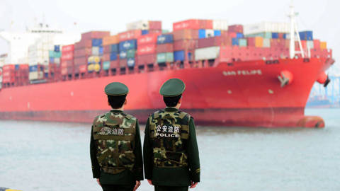 Chinese police officers cargo ship