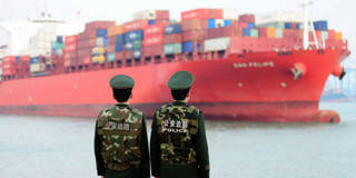 Chinese police officers cargo ship