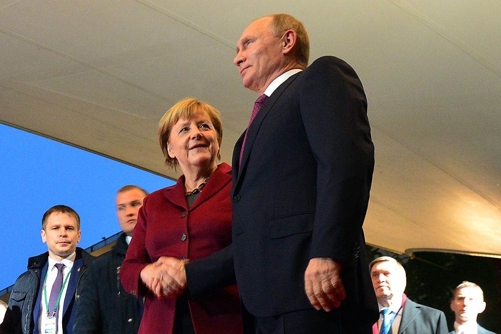 moisi133_Anadolu Agency_Getty Images_merkel putin