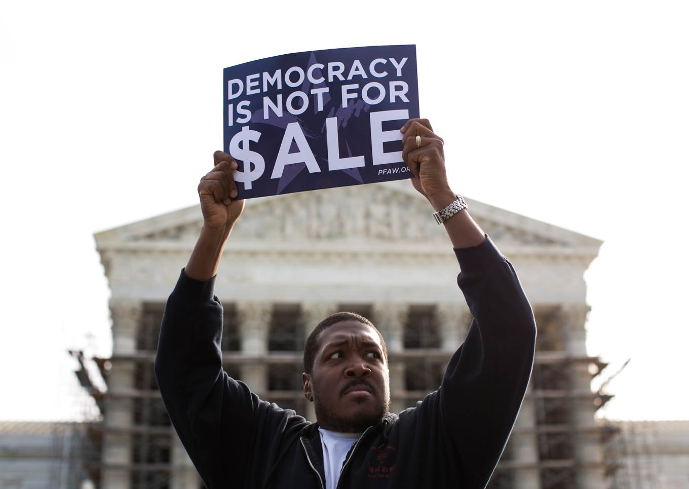 democracy is not for sale sign
